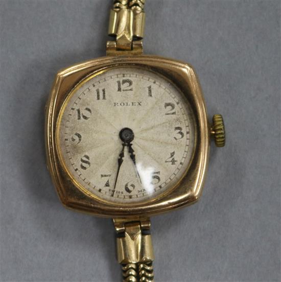 An ladys early 20th century 9ct gold Rolex manual wind wrist watch.
